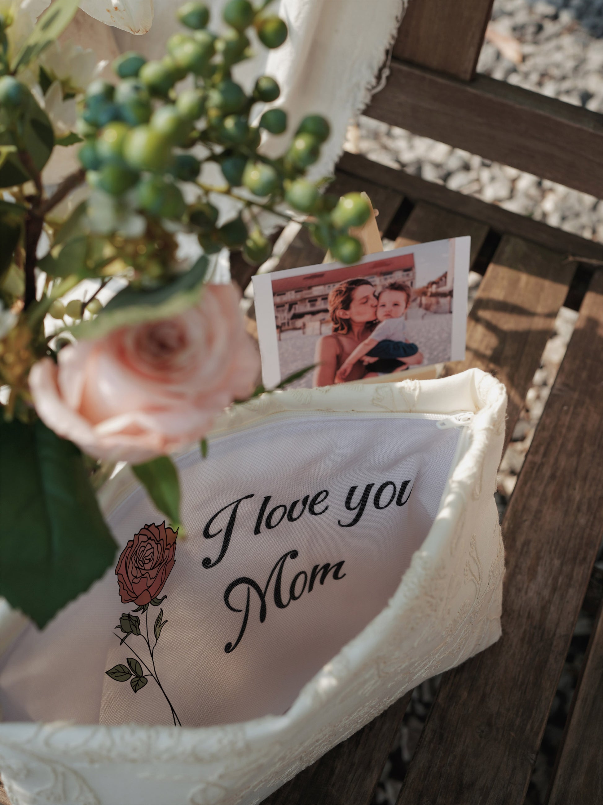 A clutch with the words "I love you mom" printed on the inside