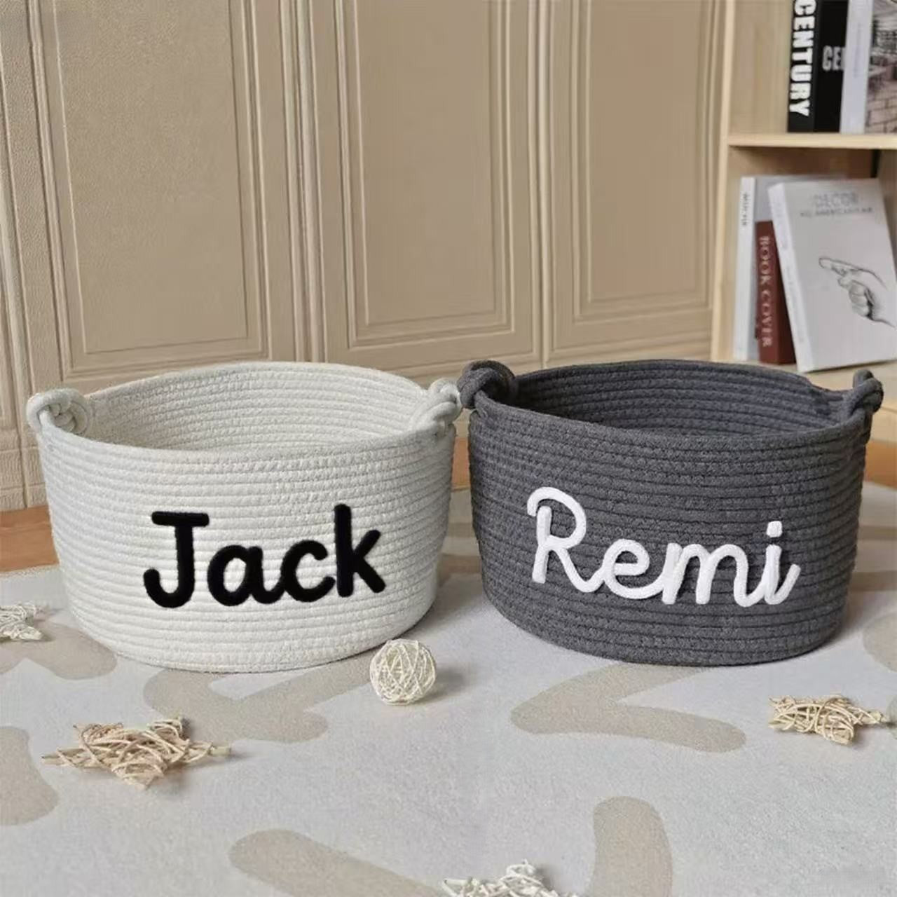 Two woven pet toy baskets labeled 'Jack' and 'Remi' 